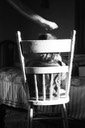 11 child in chair with hand 73SP-3.jpg
